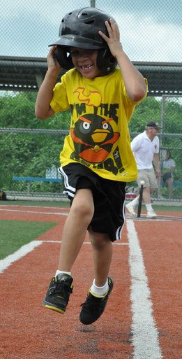 Boy with special needs having fun playing baseball photo child-with-special-needs-having-fun-playing-baseball_zpsbr2f4hbt.jpg