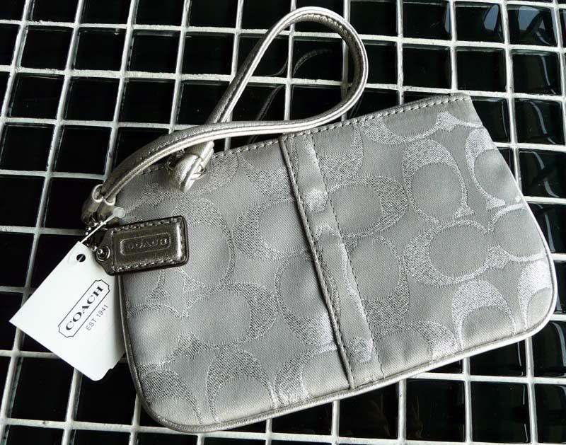 coach wristlets silver
