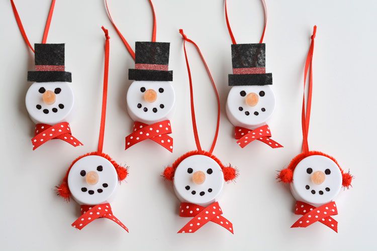 These Tea Light Snowman Ornament idea from One Little Project would make great DIY holiday classroom gifts.