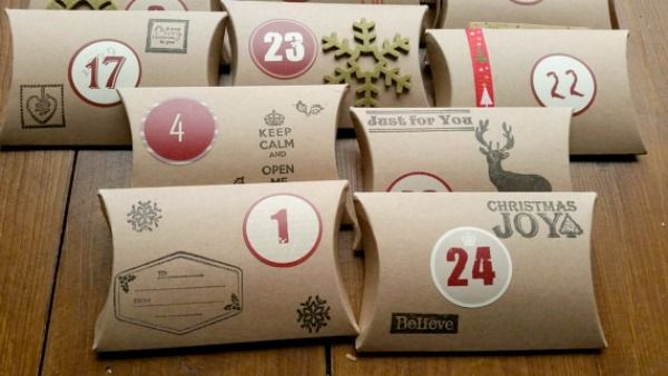 Festive and fun advent calendars: Count down the days with the pillow boxes advent calendar from Nutty Crafts Corner on Etsy.